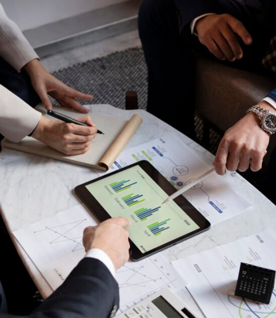 business people working with ipad high angle